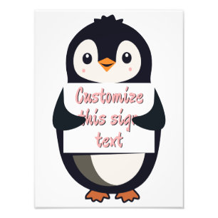 Foto Pinguim fofo segurando um sinal para texto persona