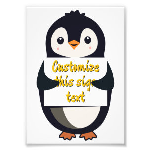 Foto Pinguim fofo segurando um sinal para texto persona