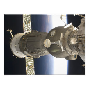 Foto Uma nave espacial de Soyuz backdropped pela terra