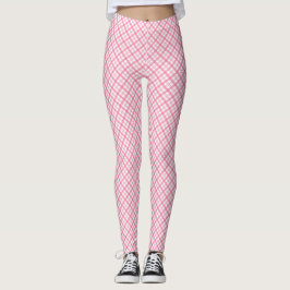 Front and back views of pink plaid leggings worn 