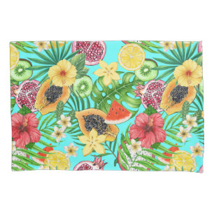 Frutas tropicais, flores e folhas em azul
