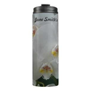 Garrafa Térmica Orquídeas brancas em um tumbler térmico