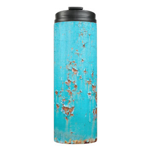 Garrafa Térmica Parede de metal pintada com azul enferrujado. Text
