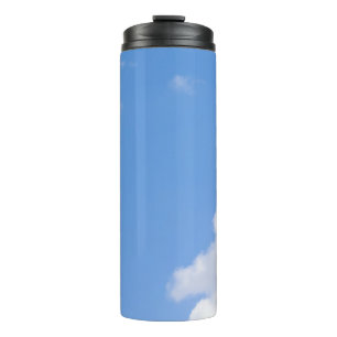 Garrafa Térmica Solitary Bird Soaring Through Bright Blue Sky with