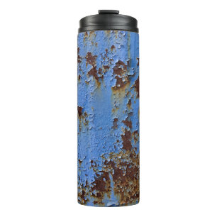 Garrafa Térmica Textura de metal e tinta azul.