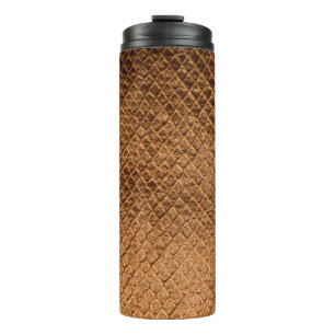 Garrafa Térmica Textura ondulada em fundo de bronze com tampa de c