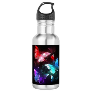 Garrafa Três Borboletas brilhantes sobre o fundo noturno