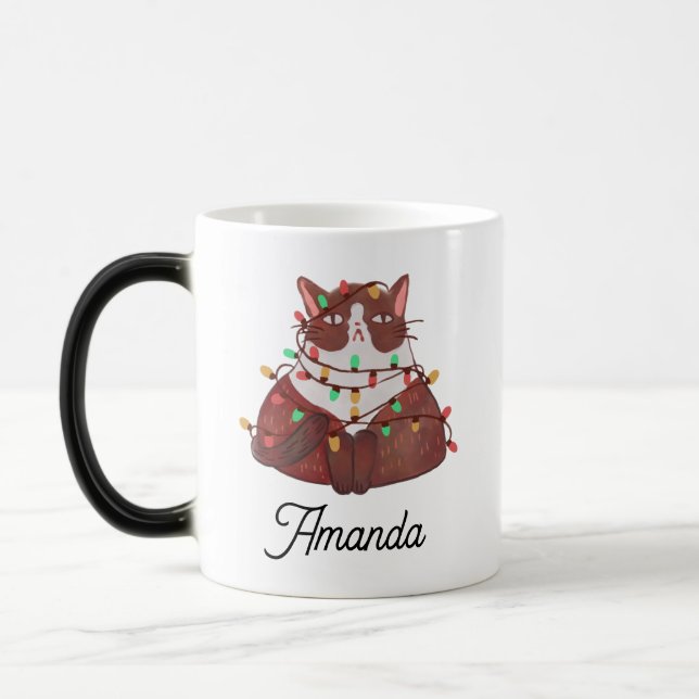 Gato bonito com caneca mágica leve de natal (Esquerda)
