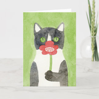 Gato com o cartão de nota da flor