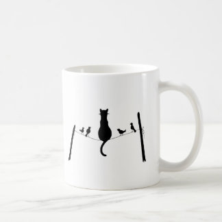 gato entre a caneca dos pombos