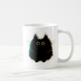 Gato macio engraçado na caneca de café