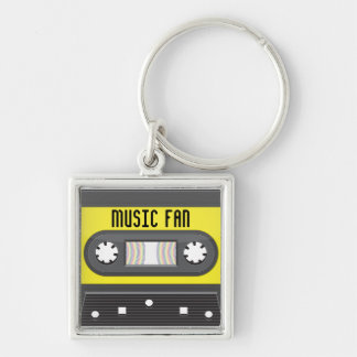Gaveta do fan de música com o chaveiro da fita do