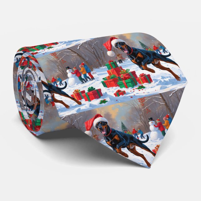 Gravata Doberman correndo em neve com chapéu de Natal (Rolled)