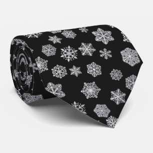 Gravata Flocos de neve de prata em um fundo preto