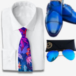 Gravata Padrão Havaiano de Aquarela Azul<br><div class="desc">A gravata impressão havaiana azul exibe um conjunto cativante de folhas tropicais coloridas em sua design. A ilustração vibrante da gravata captura a exótica e exótica beleza das ilhas havaianas, trazendo uma explosão de talento tropical a qualquer roupa. As folhas reproduzidas na gravata apresentam uma variedade de cores brilhantes e...</div>