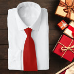 Gravata Vermelho Natal<br><div class="desc">Apresentamos o clássico Natal R3d Tie, o acessório perfeito para adicionar um toque de elegância festiva ao seu guarda-roupa de férias. Esta vibrante gravata vermelha garante um aspecto elegante e polido que é perfeito para qualquer ocasião de feriado, desde festas de escritório a reuniões familiares. A cor vermelha rica incorpora...</div>