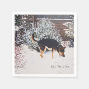 Guardanapo De Papel cão preto bonito que joga na cena da neve