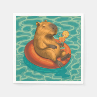 Guardanapo De Papel Capylara cocktail sur bouée à la piscine