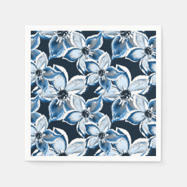 Guardanapo De Papel Flores brancas e azuis sobre fundo preto.