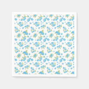 Guardanapo De Papel fundo branco com flores azuis e borra verde