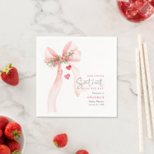 Um laço rosa de namorada bebê no chá de bebê do Di