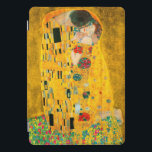 Gustav Klimt O Beijo<br><div class="desc">capa de ipad com pintura a óleo de Gustav Klimt com folha de ouro The Kiss (1908). Um homem e uma mulher,  vestindo cores ouros brilhantes,  adoravelmente abraçando e beijando num campo de flores. Um presente de excelente para fãs de Arte Nouveau e de Arte Austríaca.</div>
