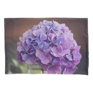 Hydrangea roxo bonito na fotografia do frasco de