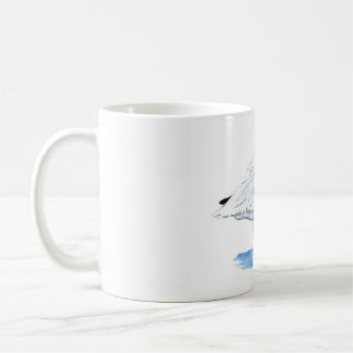 Ibis branco em uma caneca de café