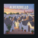 Íman Alberobello Itália Trulli casas Viagem<br><div class="desc">As casas de Trulli em Alberobello, Itália, estão entre as estruturas arquitetônicas mais distintas do mundo. Estas residências brancas, casadas com cascos, feitas de calcário e construídas sem argamassa, são uma assinatura da região da Apúlia. Namorando do século 14, trulli foi originalmente construído nessa técnica de pedra seca para permitir...</div>