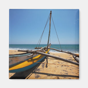 Íman Barco de pesca amarrado na praia
