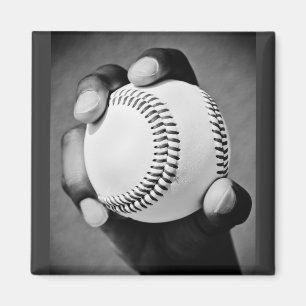 Íman beisebol na mão