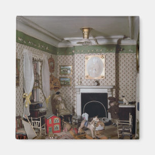 Íman Berçário com os brinquedos da "senhorita Milha"