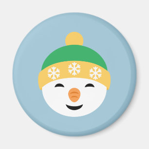 Íman Boneco de neve do Natal no chapéu verde na luz -