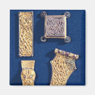Íman Broche e curvaturas