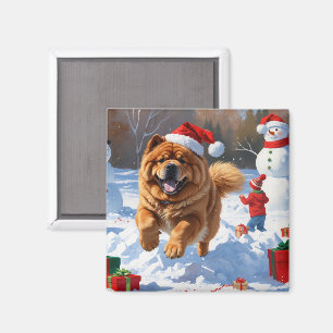 Íman Chow Chow Correndo na Neve com Chapéu de Natal