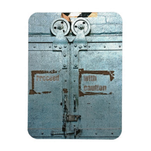 Íman Continue com a porta industrial do cinza azul do