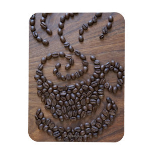 Íman Copo do café ilustrado usando feijões de café