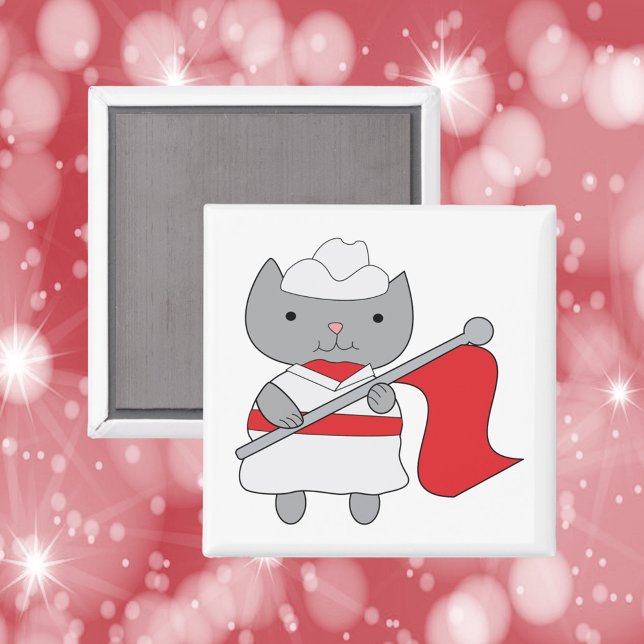 Íman Cor Guarda Vermelho Branco (A magnet featuring a gray cat in a red and white color guard uniform.)