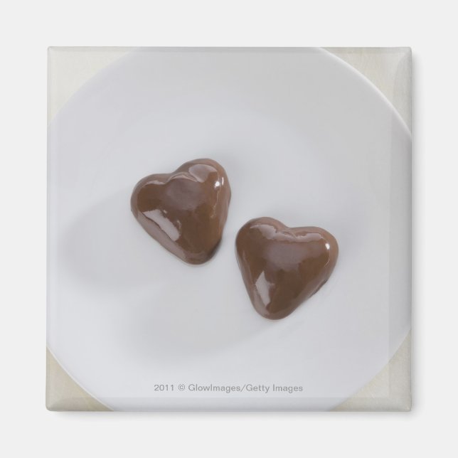 Íman Corações de chocolate em forma de coração em uma p (Frente)