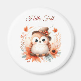 Íman Coruja de outono giro sentado em uma filial