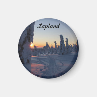 Íman Couché de soleil sur la forêt enneigé de Laponie