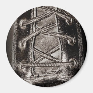 Íman Couro e laços pretos