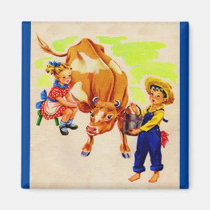Íman crianças adoráveis com uma vaca adorável