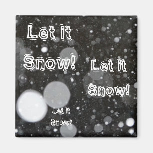Íman Deixe nevar em um fundo de neve