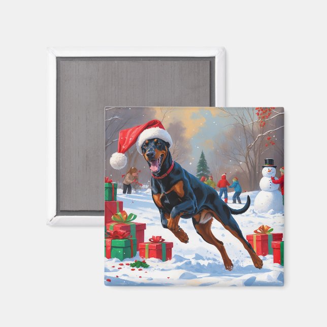 Íman Doberman Correndo na Neve com Chapéu de Natal (Front/Back)