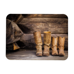 Íman Dois pares de botas de cowboy Vestidas em cabine