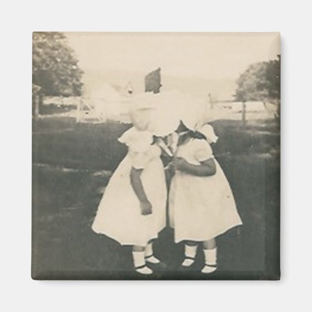 Íman duas meninas bebendo ímã (Frente)