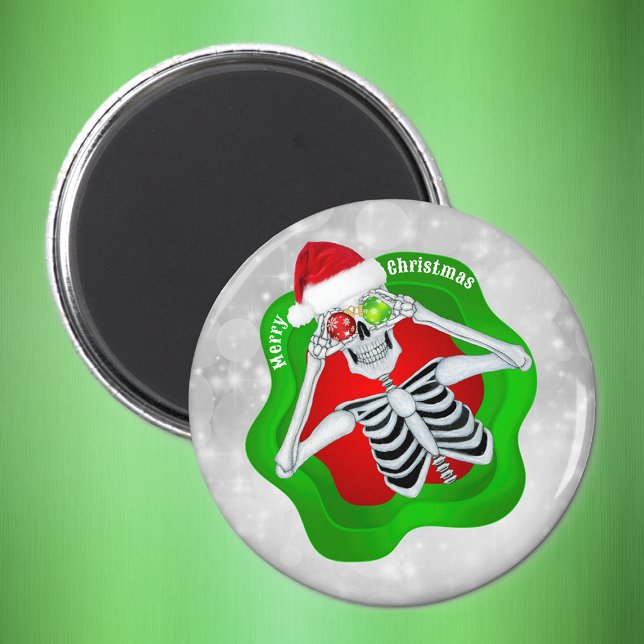 Íman Esqueleto de Natal Ornamentos Forma de Splatter Cí (Fun Skeleton ornament Eyes Santa hat white circles on Merry Christmas magnet.)