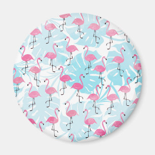 Íman flamingos graciosos e folhas de monstera