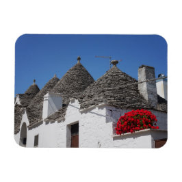Íman Flores de gerânio e casas de trulli em Alberobello